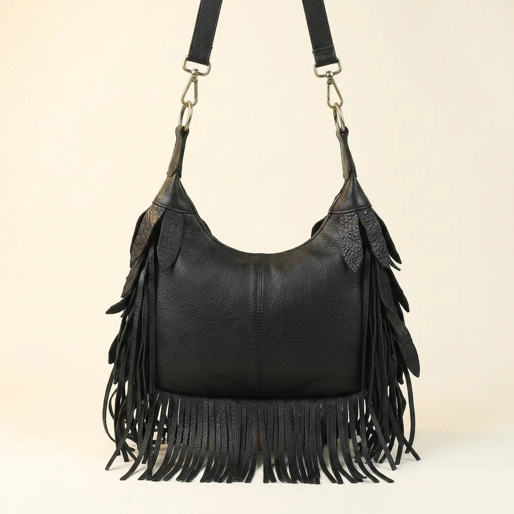 Back panel of Black bohemian tassel fringe bag with strap attachments