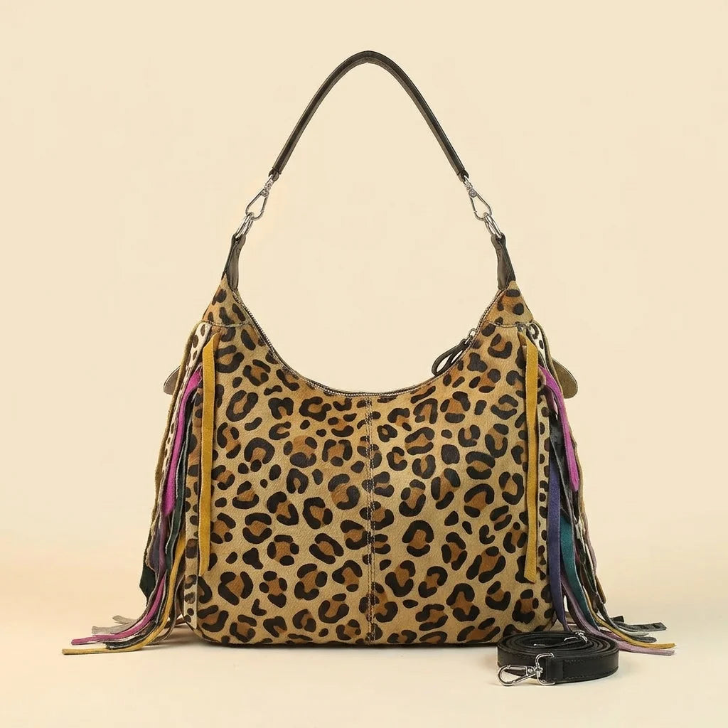 Back panel of Multicolor bohemian tassel fringe bag with strap attachments