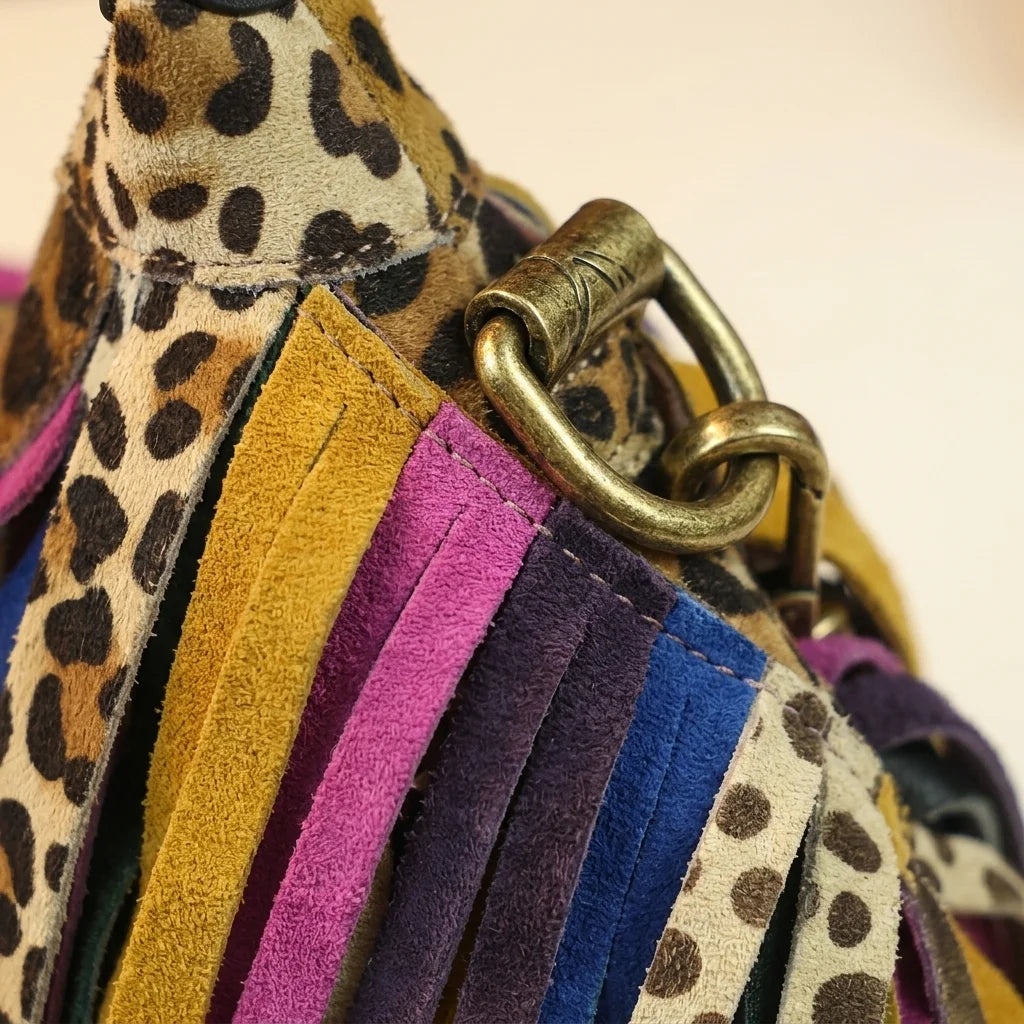 Close-up of fringe stitching and texture on Multicolor bohemian tassel fringe bag