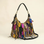 Multicolor bohemian tassel fringe bag, three-quarter angle showing side depth