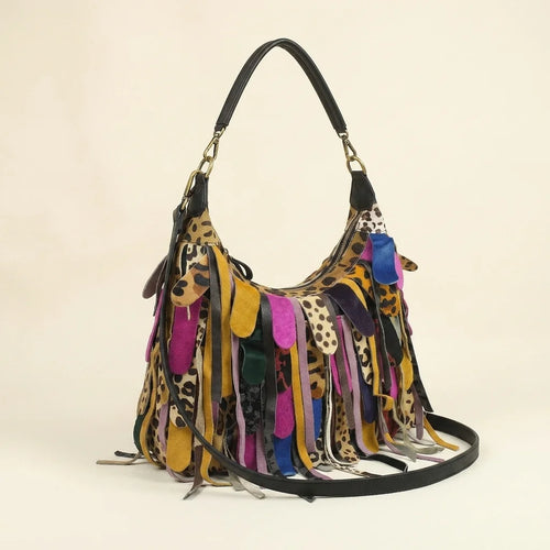 Multicolor bohemian tassel fringe bag, three-quarter angle showing side depth