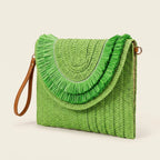 Green boho fringe bag clutch, three-quarter angle showing side depth
