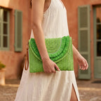 Woman wearing Green boho fringe bag clutch with swaying fringe