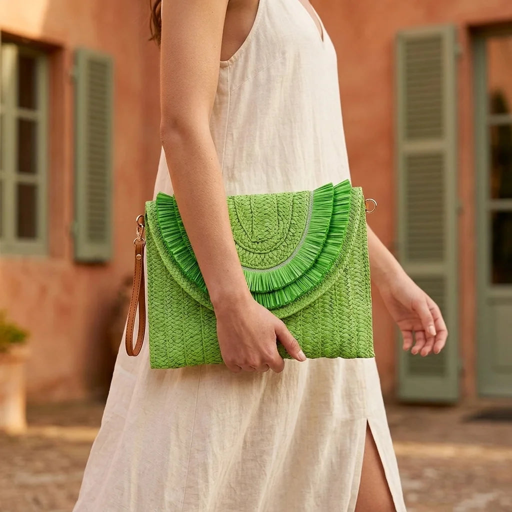 Woman wearing Green boho fringe bag clutch with swaying fringe