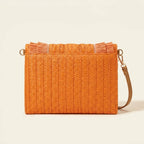 Back panel of Orange boho fringe bag clutch with strap attachments