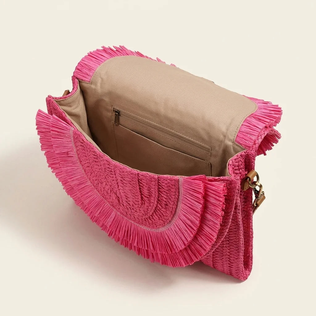 Interior lining and pockets of Pink boho fringe bag clutch