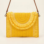Back panel of Yellow boho fringe bag clutch with strap attachments