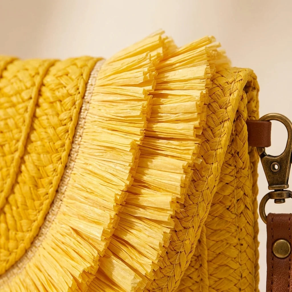 Close-up of fringe stitching and texture on Yellow boho fringe bag clutch