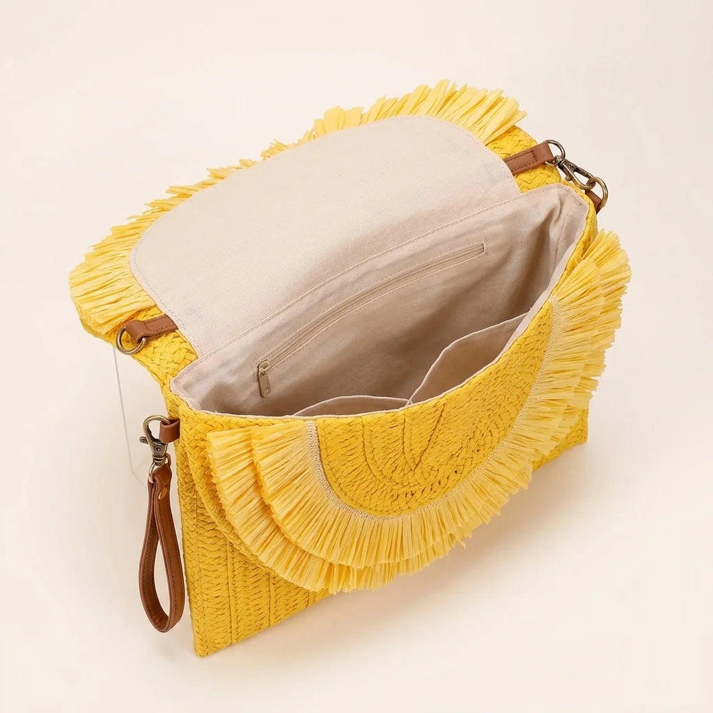 Interior lining and pockets of Yellow boho fringe bag clutch