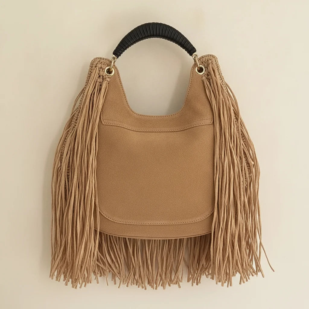 Back panel of Tan boho fringe hobo bag with strap attachments