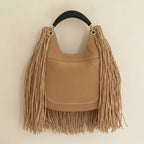 Back panel of Tan boho fringe hobo bag with strap attachments