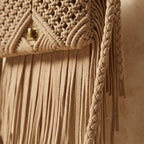 Close-up of fringe stitching and texture on Beige boho fringe shoulder bag