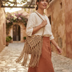 Woman wearing Khaki boho fringe shoulder bag with swaying fringe