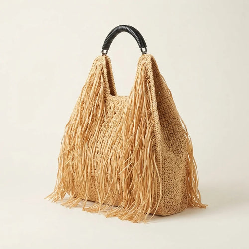 Brown boho fringe tote bag, three-quarter angle showing side depth