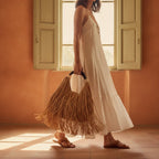 Woman wearing Brown boho fringe tote bag with swaying fringe