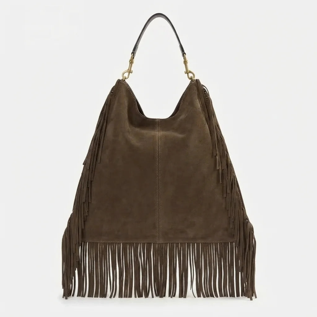 Back panel of Brown boho leather fringe bag with strap attachments