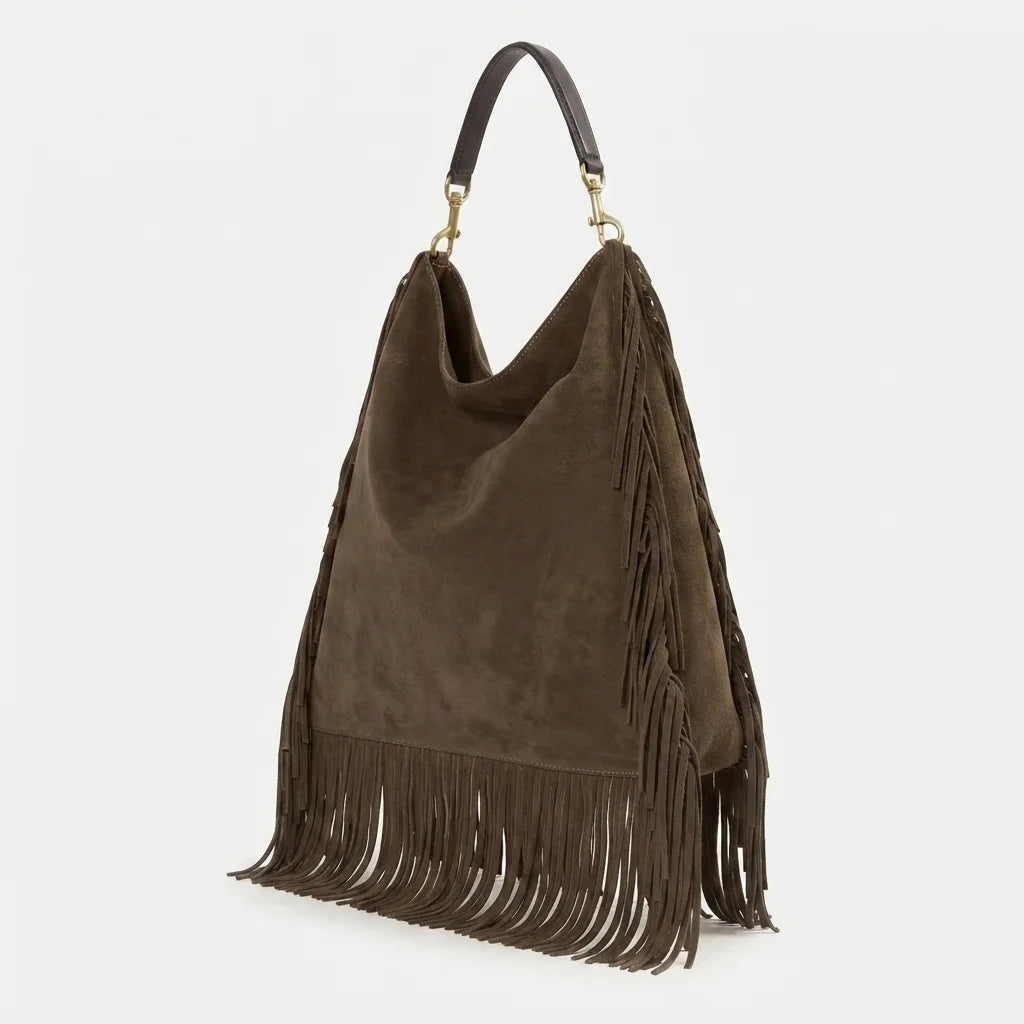 Brown boho leather fringe bag, three-quarter angle showing side depth