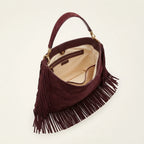Interior lining and pockets of Maroon boho leather fringe bag