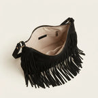 Interior lining and pockets of Black boho style fringe bag