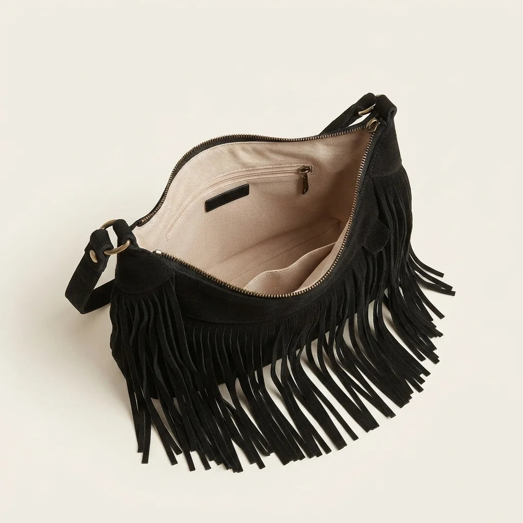 Interior lining and pockets of Black boho style fringe bag