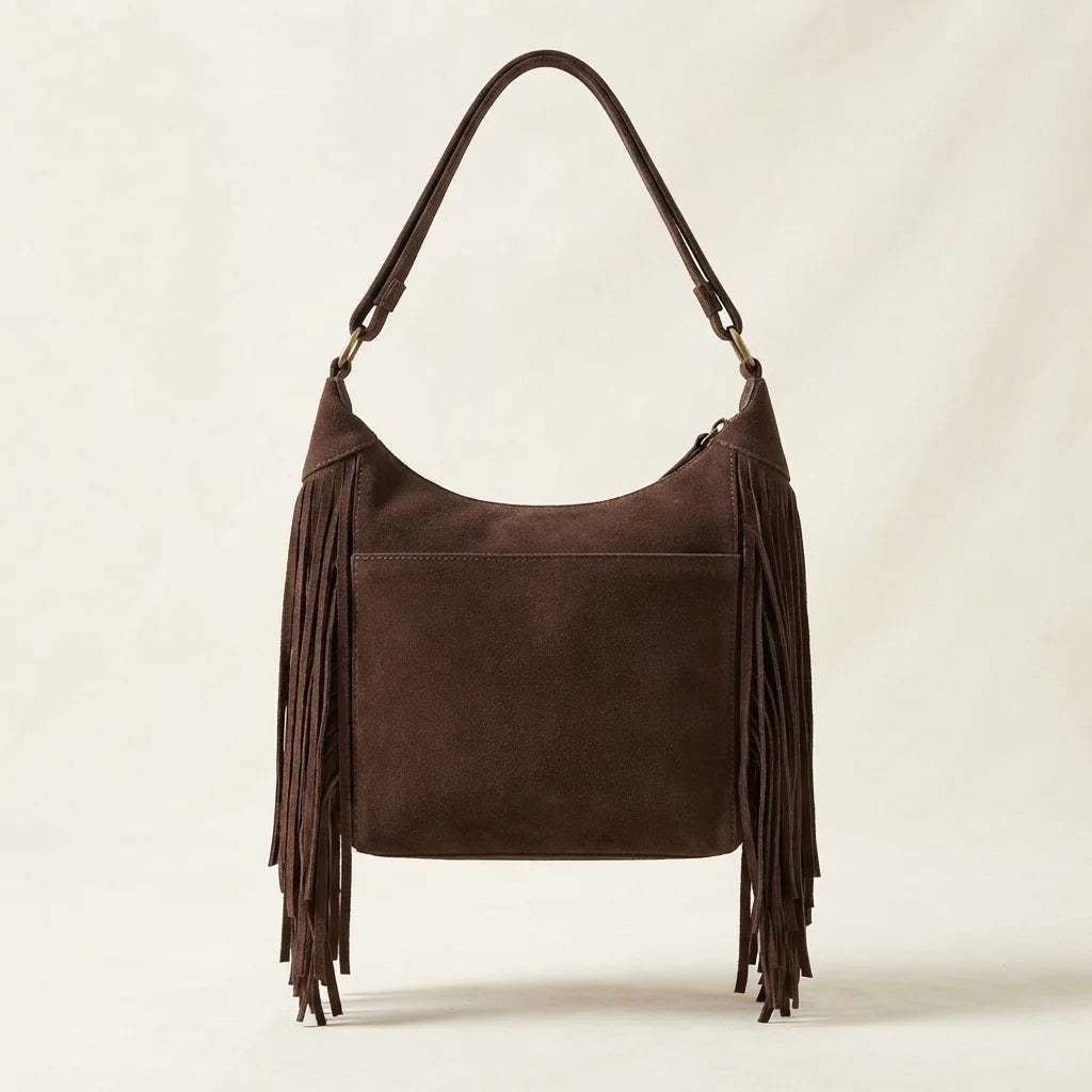 Back panel of Dark Brown boho style fringe bag with strap attachments