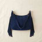 Back panel of Navy boho style fringe bag with strap attachments