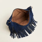 Interior lining and pockets of Navy boho style fringe bag