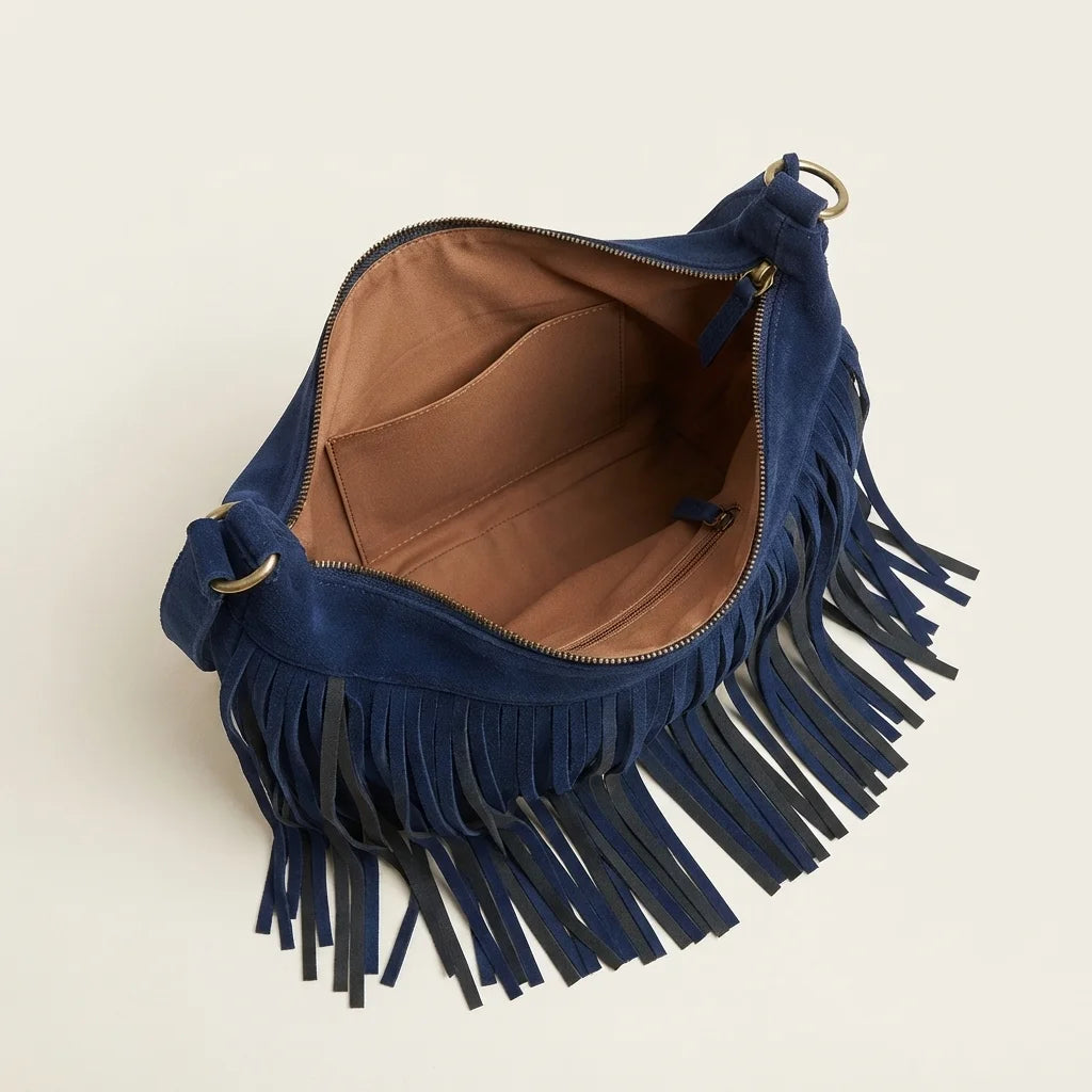 Interior lining and pockets of Navy boho style fringe bag