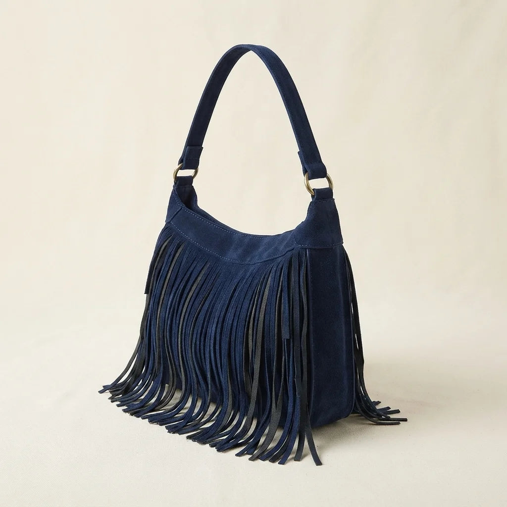 Navy boho style fringe bag, three-quarter angle showing side depth