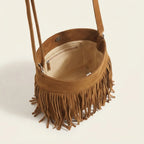 Interior lining and pockets of Brown brown fringe bucket bag