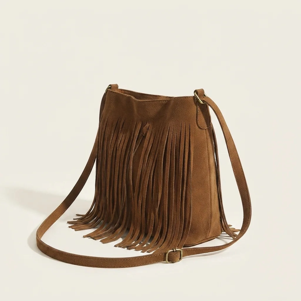 Brown brown fringe bucket bag, three-quarter angle showing side depth