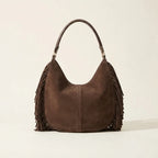 Back panel of Coffee brown fringe hobo bag with strap attachments