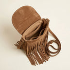 Interior lining and pockets of Brown brown fringe messenger bag