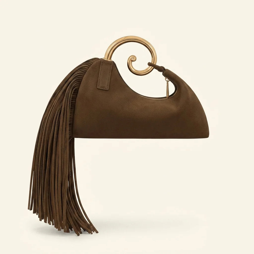 Back panel of Brown brown fringe shoulder bag with strap attachments
