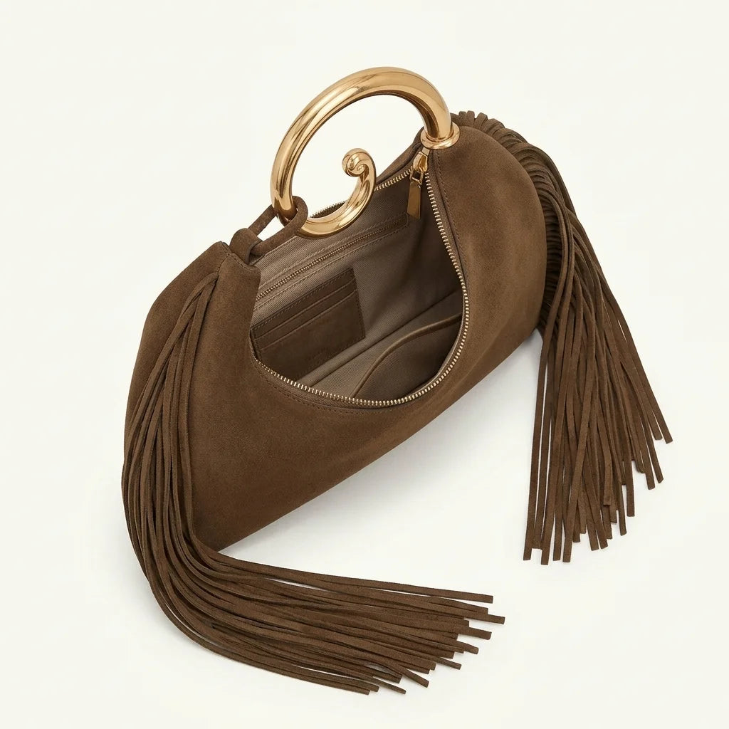 Interior lining and pockets of Brown brown fringe shoulder bag