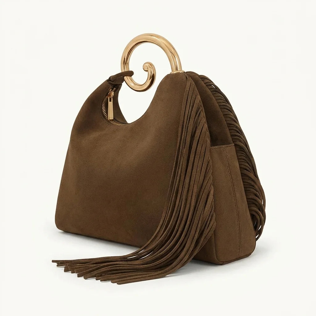 Brown brown fringe shoulder bag, three-quarter angle showing side depth