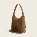 Brown brown fringe suede bag, three-quarter angle showing side depth