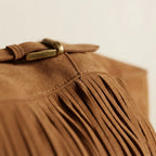 Close-up of fringe stitching and texture on Brown brown fringe tote bag