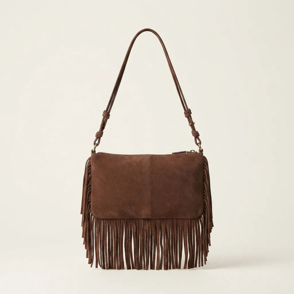 Back panel of Brown brown fringed sling bag with strap attachments