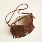 Interior lining and pockets of Brown brown fringed sling bag