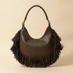Back panel of Brown brown leather hobo fringe bag with strap attachments