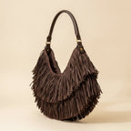 Brown brown leather hobo fringe bag, three-quarter angle showing side depth