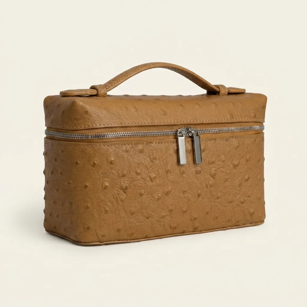 Golden Brown brown leather shoulder bag with fringe, three-quarter angle showing side depth