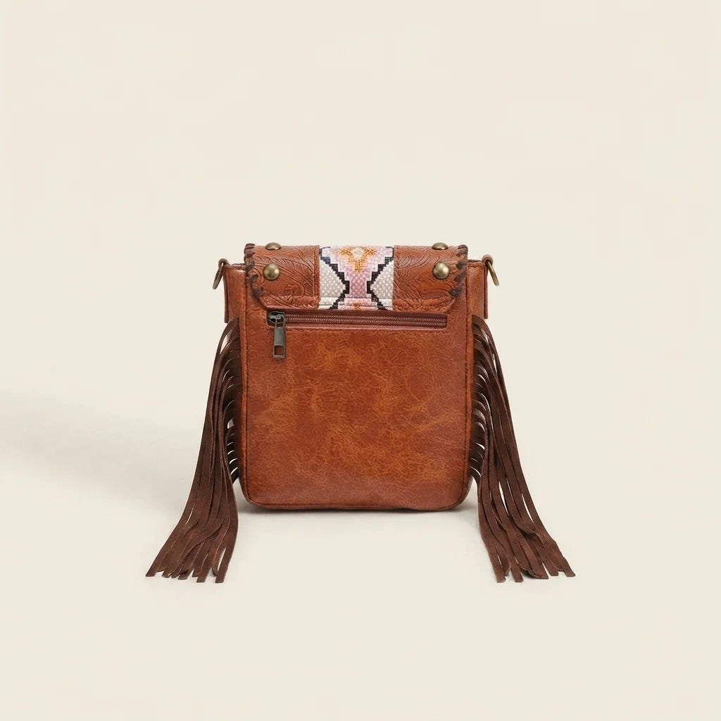 Back panel of Brown brown studded fringe hobo crossbody bag with strap attachments