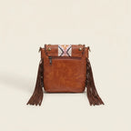 Back panel of Brown brown studded fringe hobo crossbody bag with strap attachments