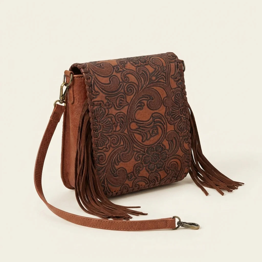 Brown brown studded fringe hobo crossbody bag, three-quarter angle showing side depth