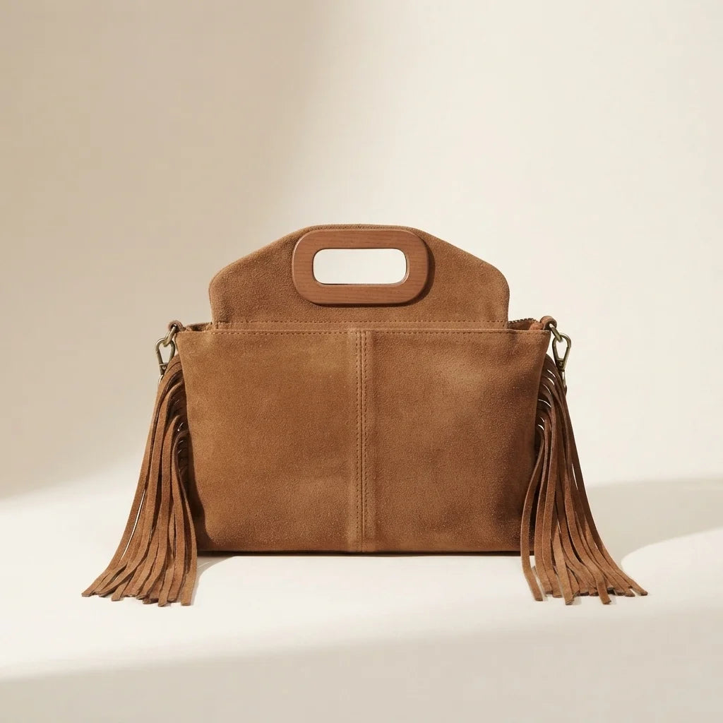 Back panel of Brown brown suede fringe shoulder bag with strap attachments