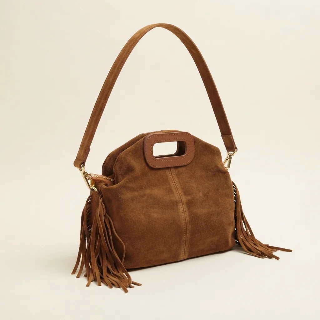 Brown brown suede fringe shoulder bag, three-quarter angle showing side depth