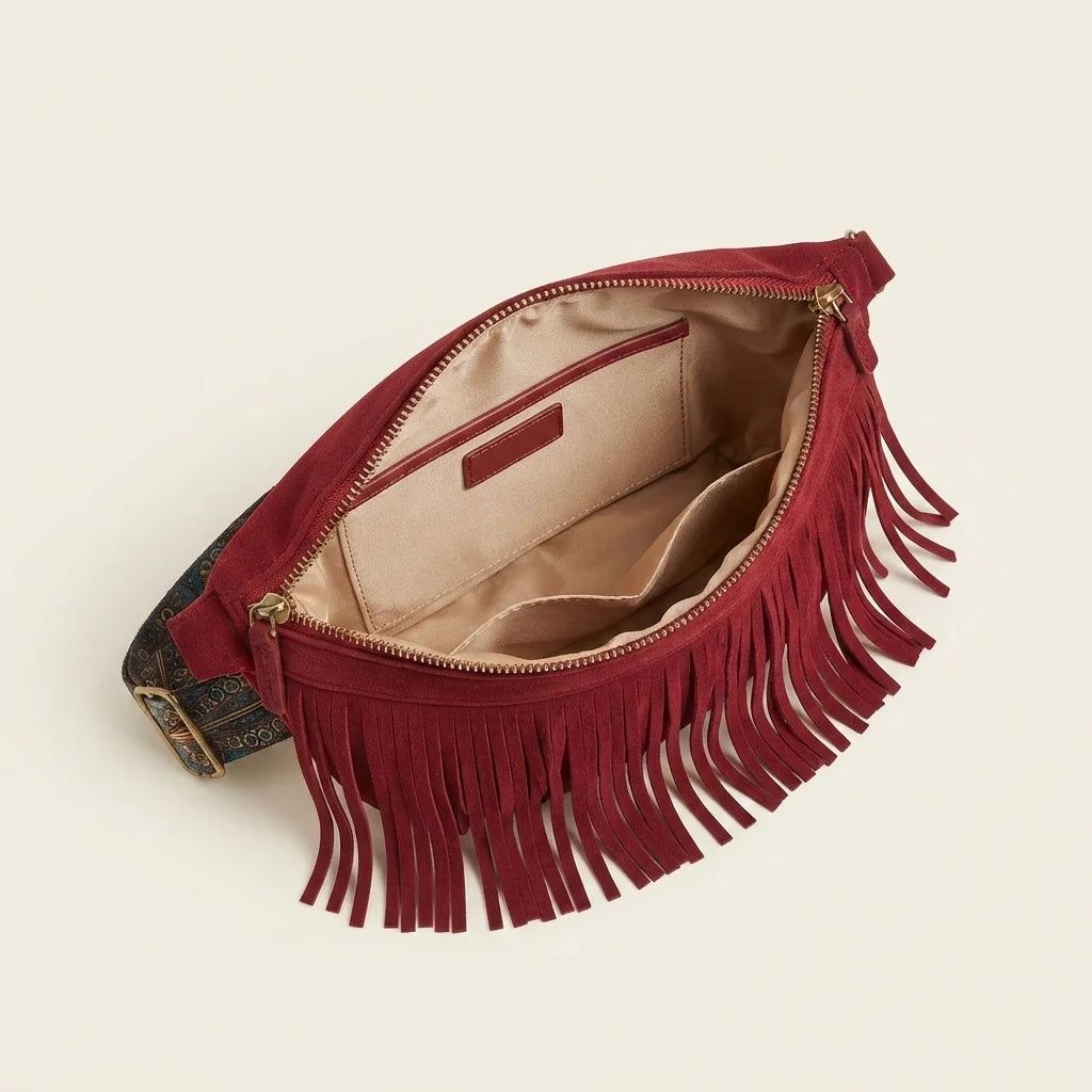 Interior lining and pockets of Red burgundy fringe bag
