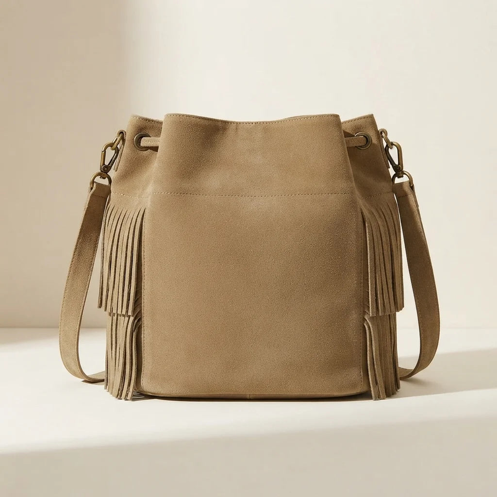 Back panel of Khaki camel fringe bucket bag with strap attachments